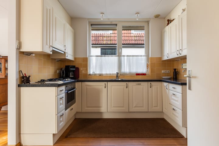 Foto 8 van Tienwoningenweg 9