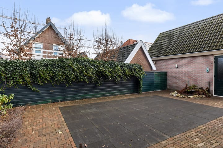 Foto 10 van Tienwoningenweg 9