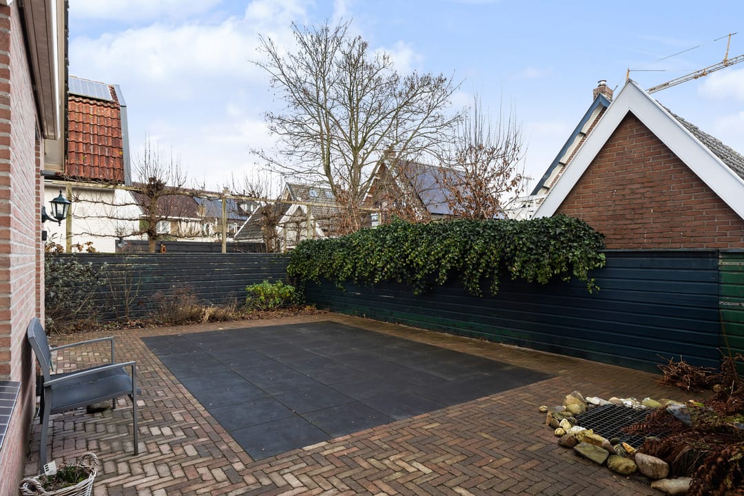 Foto 11 van Tienwoningenweg 9