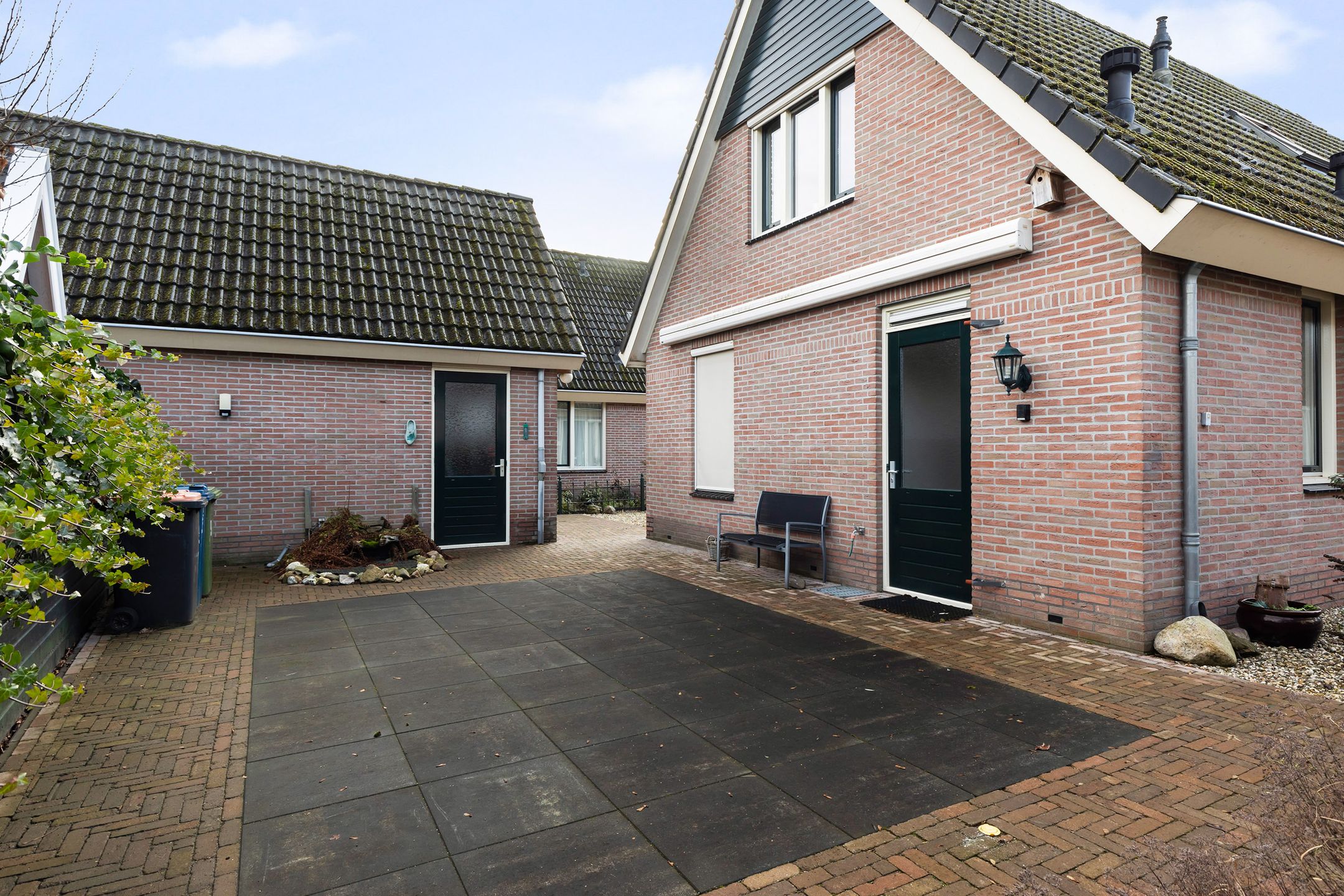 Foto 12 van Tienwoningenweg 9