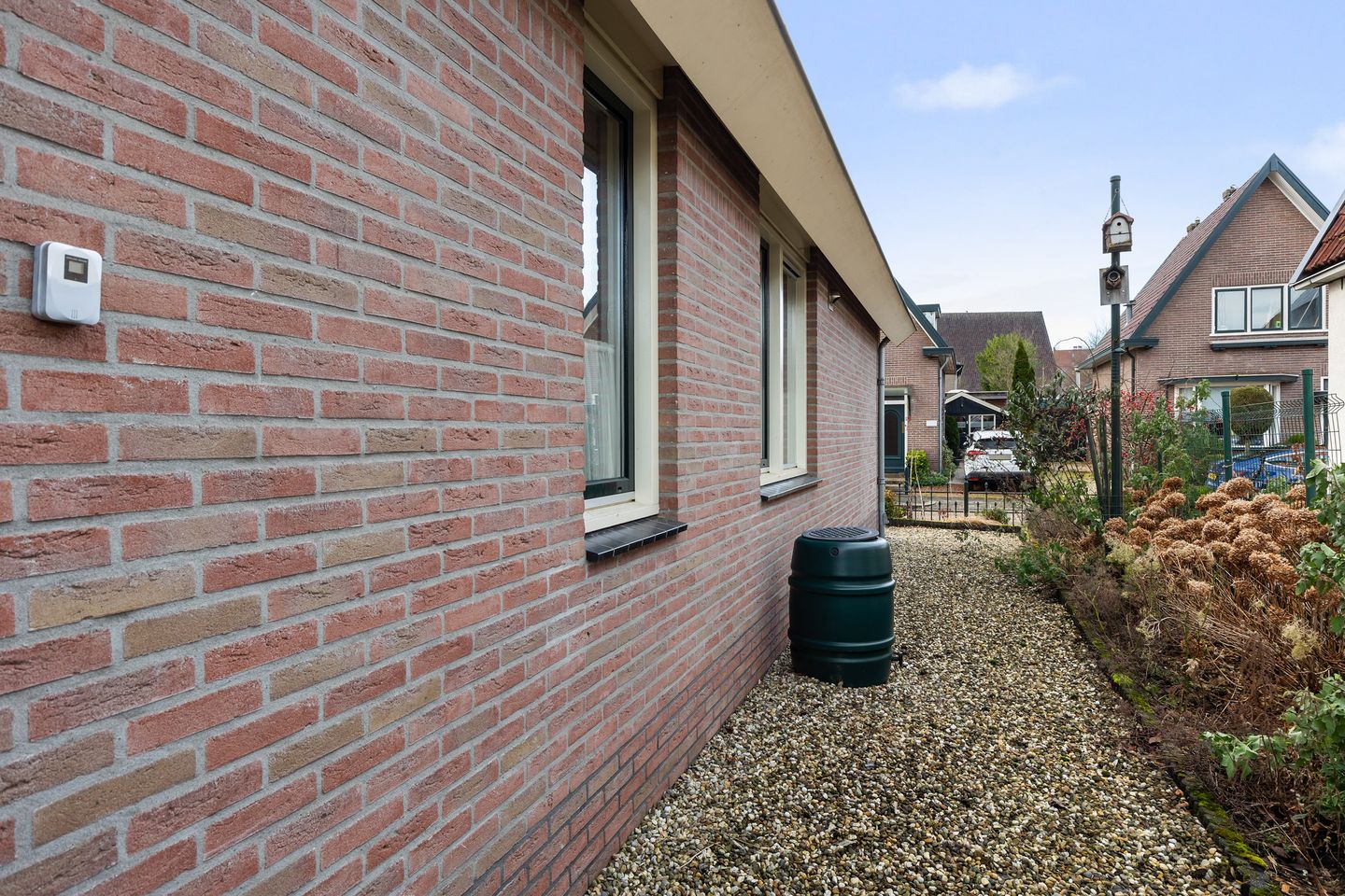 Foto 14 van Tienwoningenweg 9