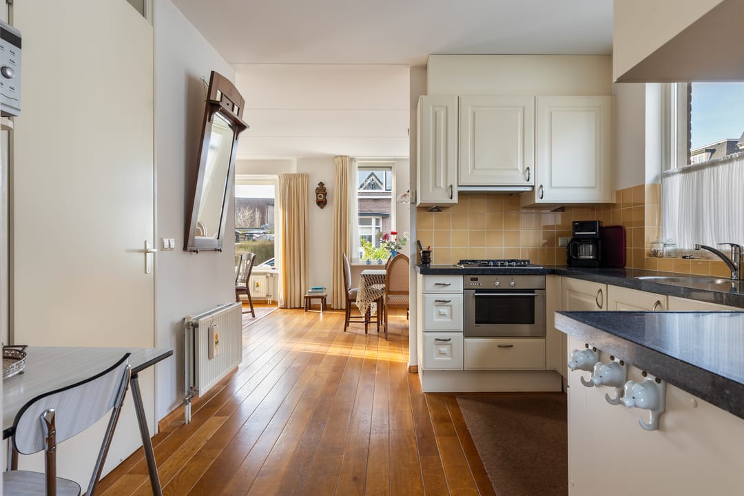 Foto 16 van Tienwoningenweg 9