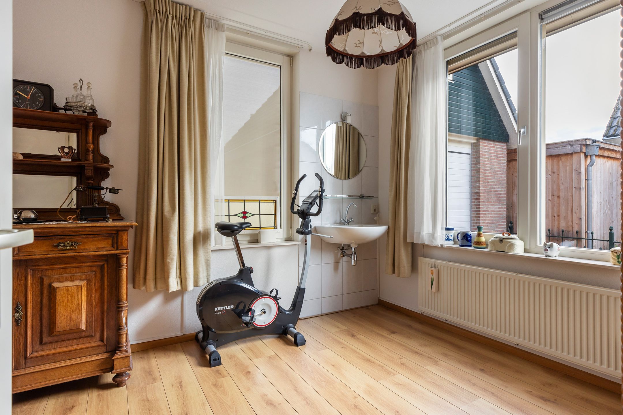 Foto 18 van Tienwoningenweg 9