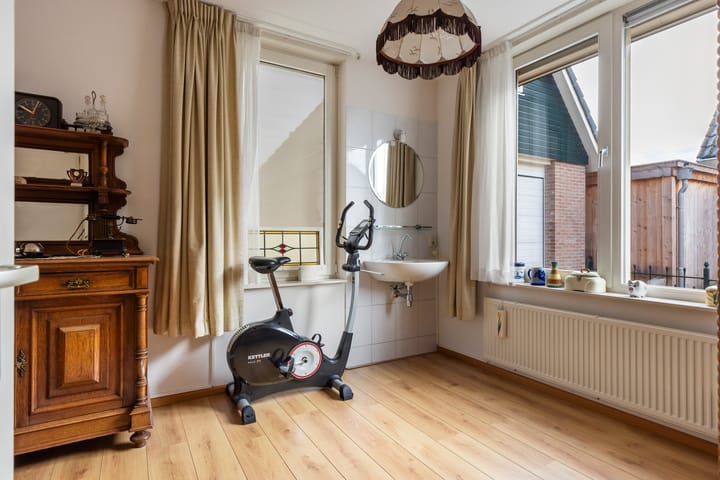 Foto 18 van Tienwoningenweg 9