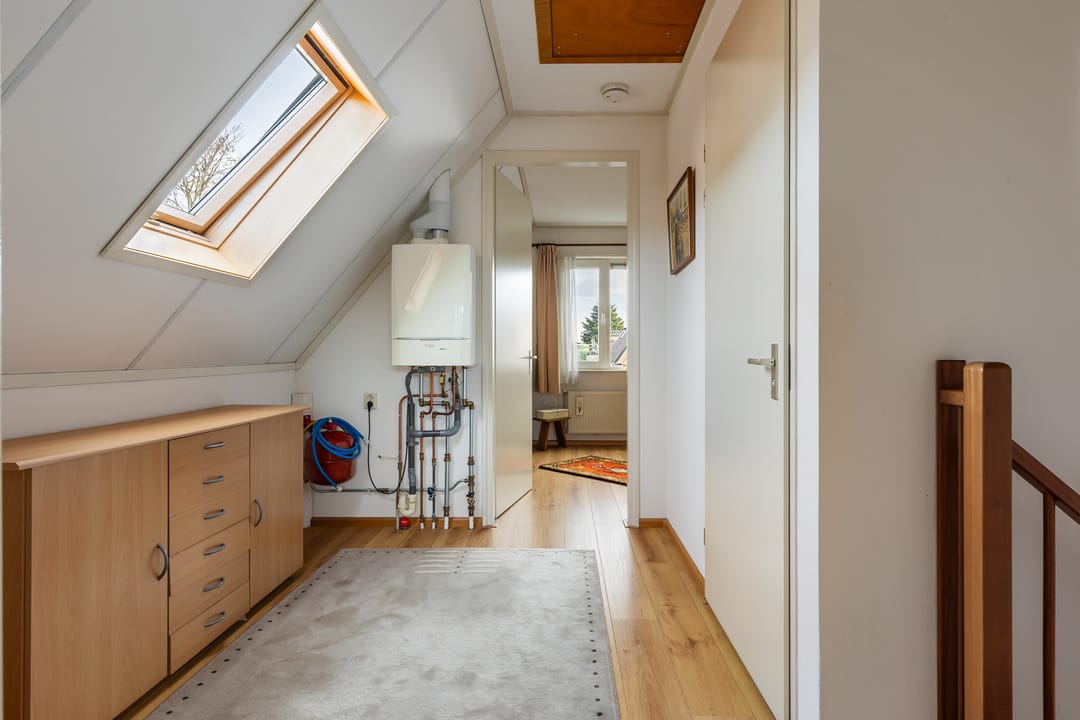 Foto 22 van Tienwoningenweg 9