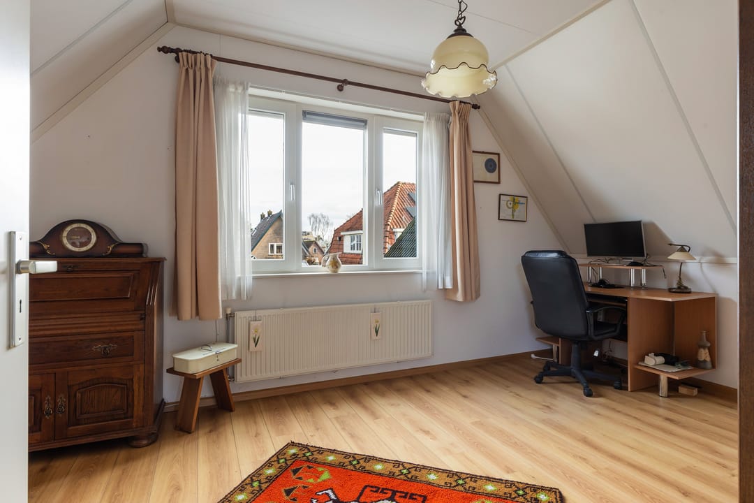 Foto 23 van Tienwoningenweg 9