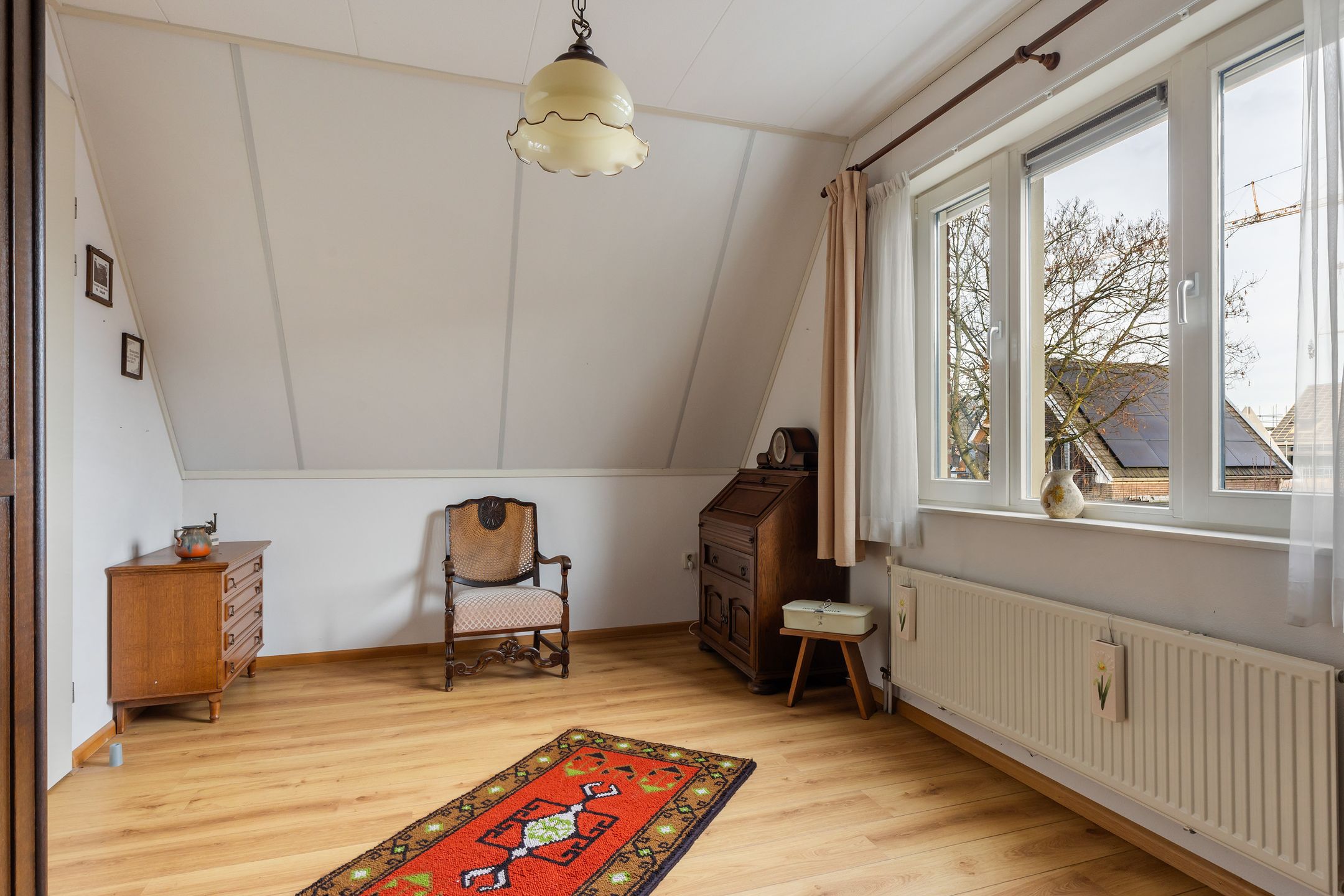 Foto 24 van Tienwoningenweg 9