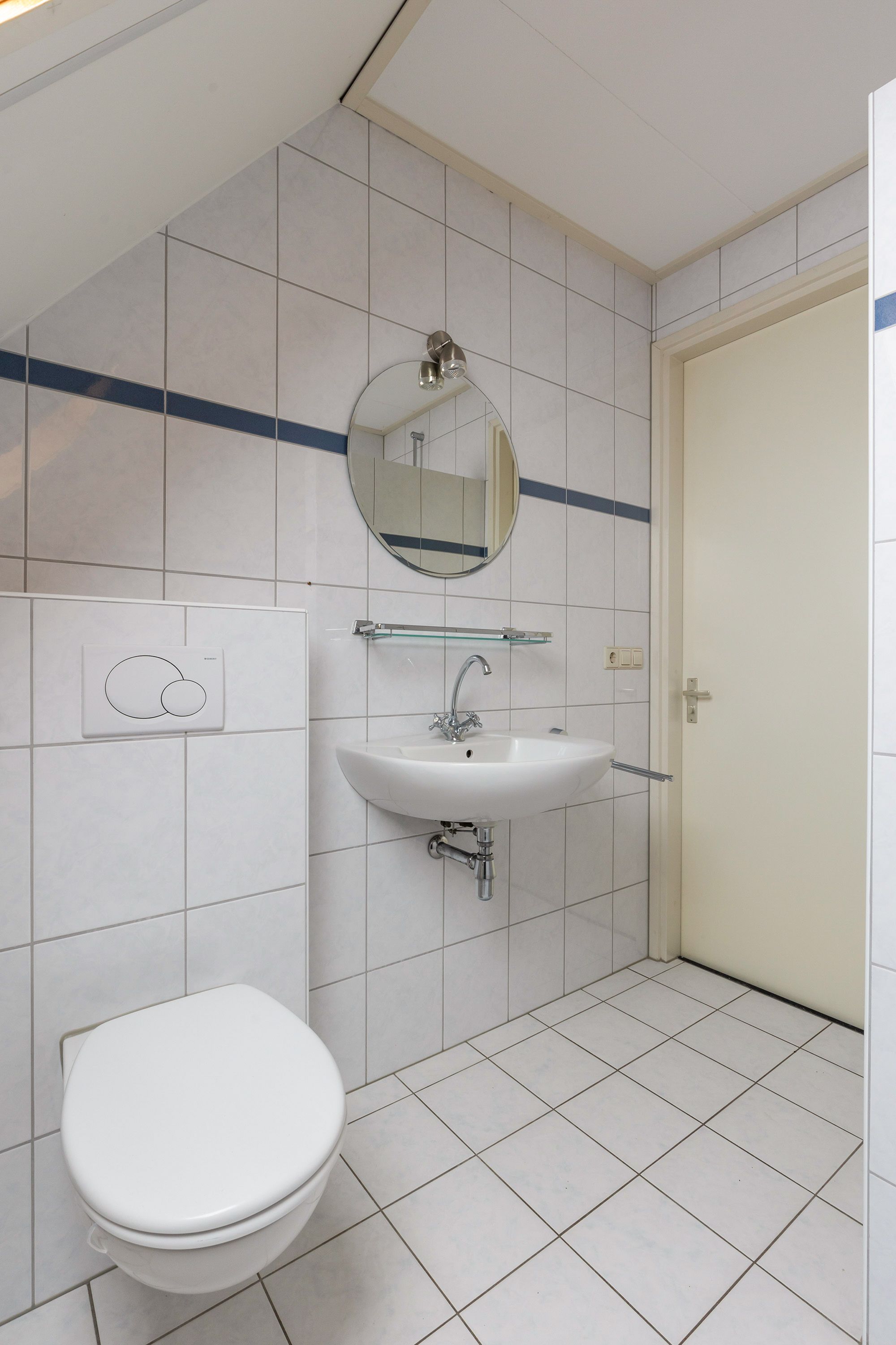 Foto 27 van Tienwoningenweg 9