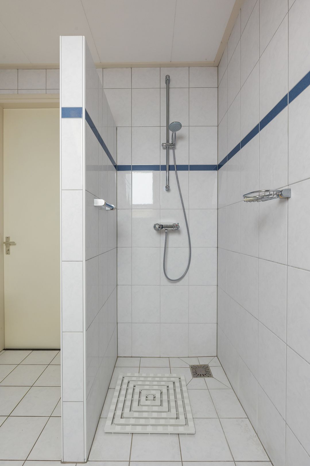 Foto 28 van Tienwoningenweg 9