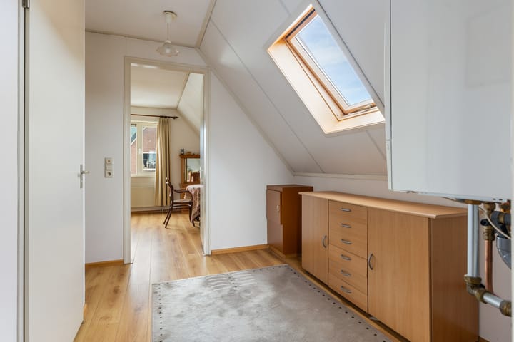 Foto 29 van Tienwoningenweg 9