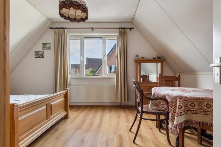 Foto 30 van Tienwoningenweg 9