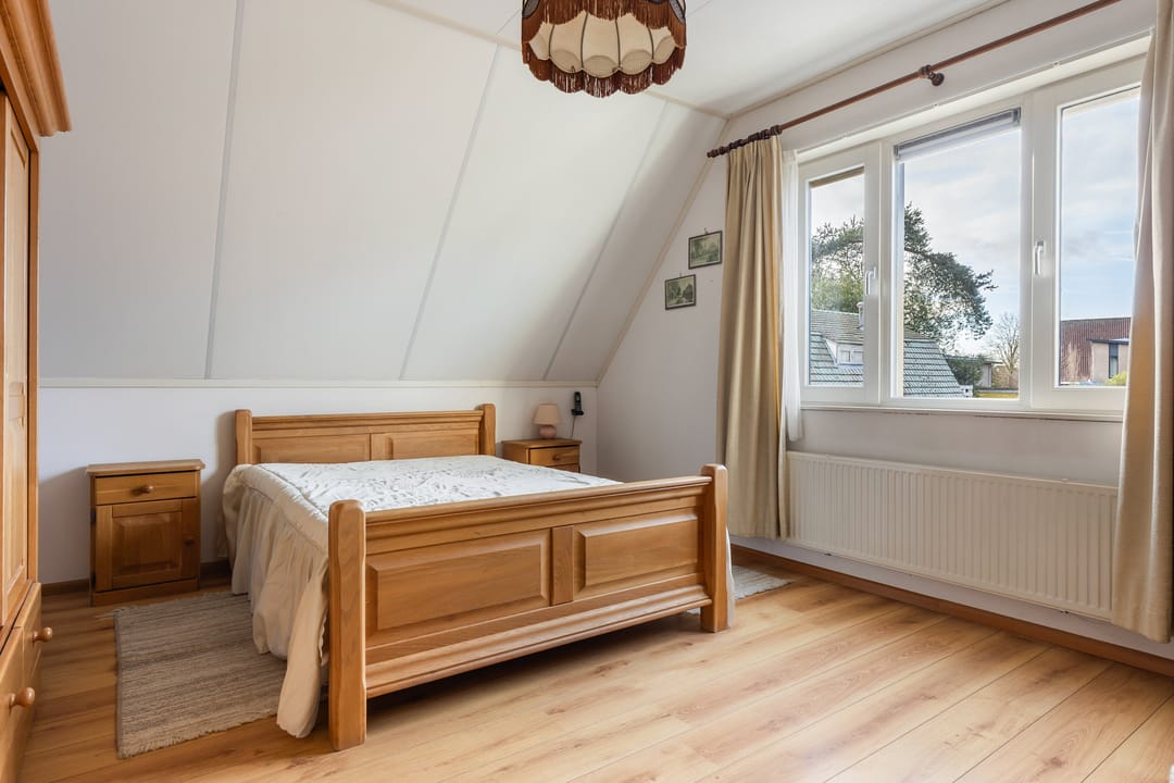 Foto 31 van Tienwoningenweg 9