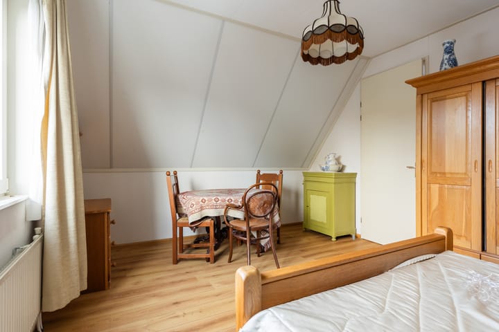 Foto 32 van Tienwoningenweg 9