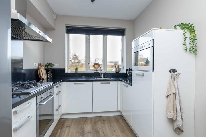 Foto 15 van Koningspage 87