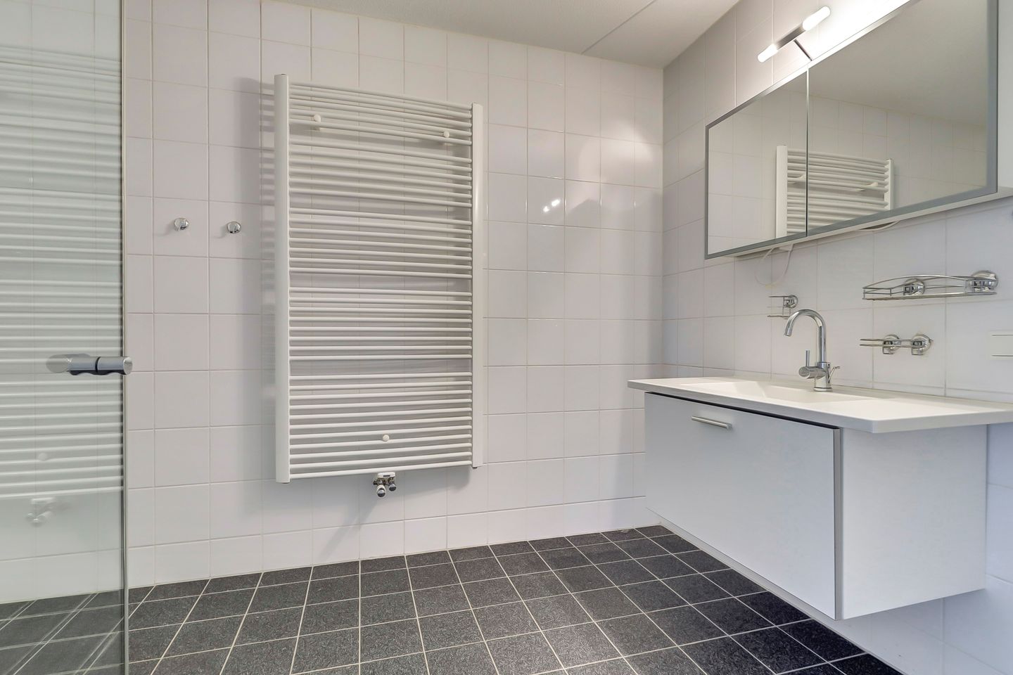 Foto 20 van Raesbergenstraat 31