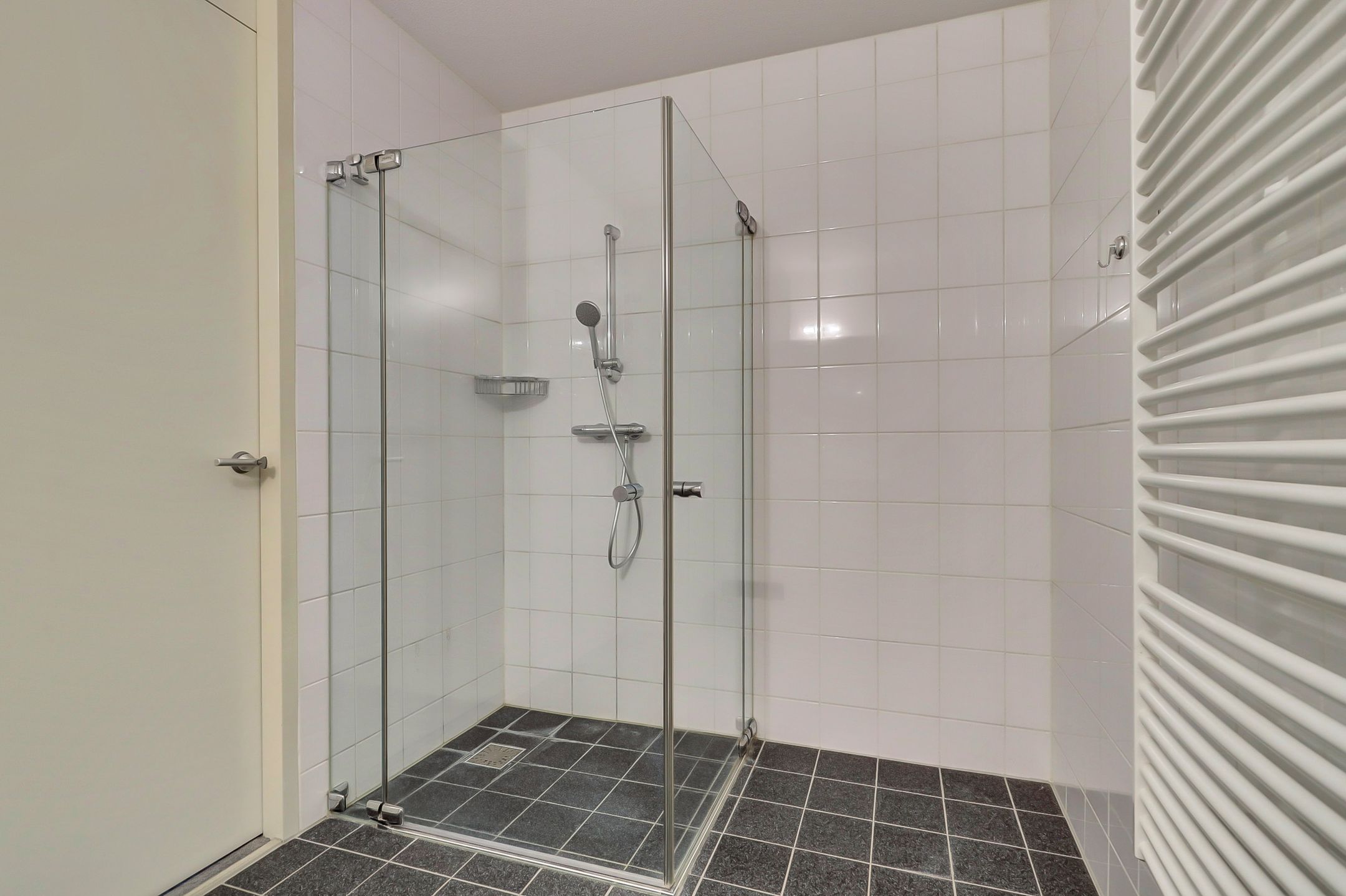 Foto 21 van Raesbergenstraat 31