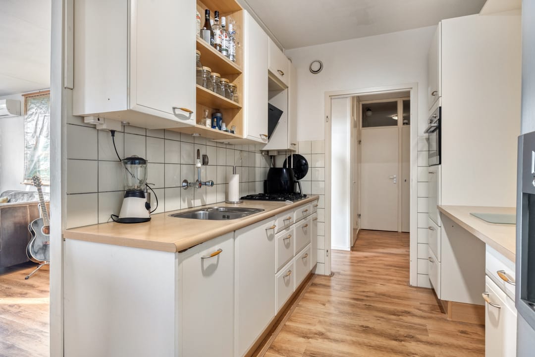 Foto 11 van Heutinkstraat 37