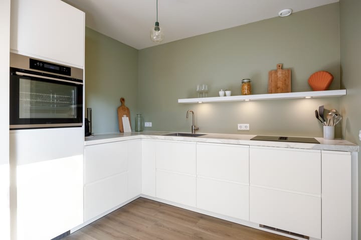 Foto 3 van Weegbree 18