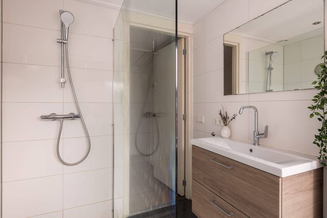 Foto 28 van Oudwijkerdwarsstraat 115