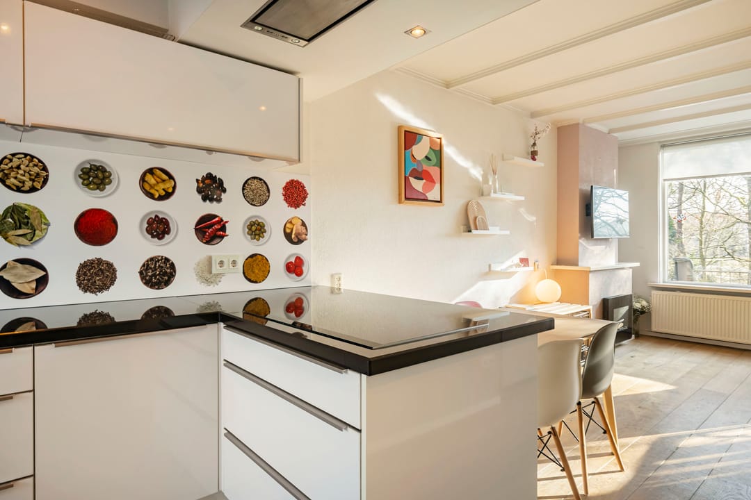 Foto 17 van van Heutszlaan 138-1