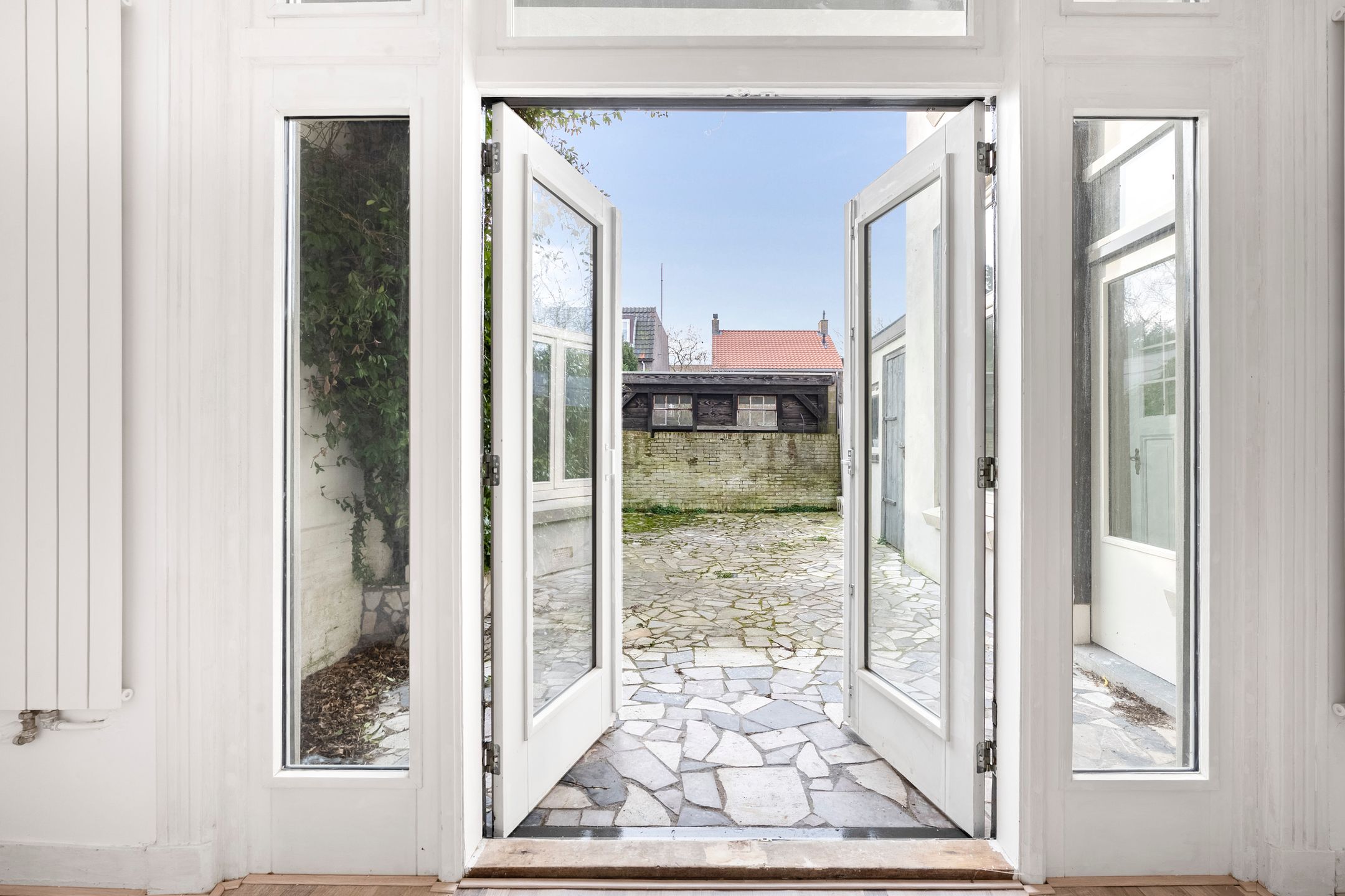 Foto 15 van Haarlemmerstraat 74