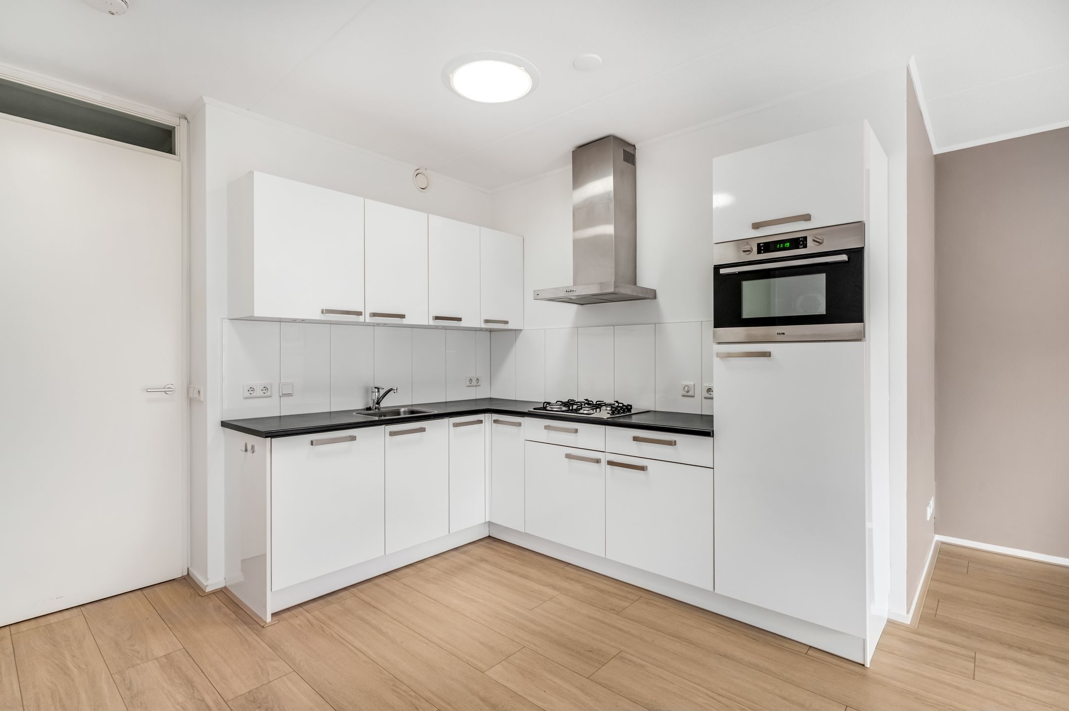 Foto 15 van Raadhuisplein 11-E