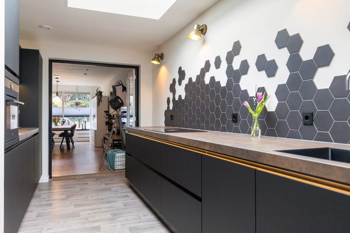 Foto 13 van Tienwoningenweg 39