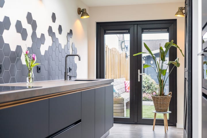 Foto 15 van Tienwoningenweg 39