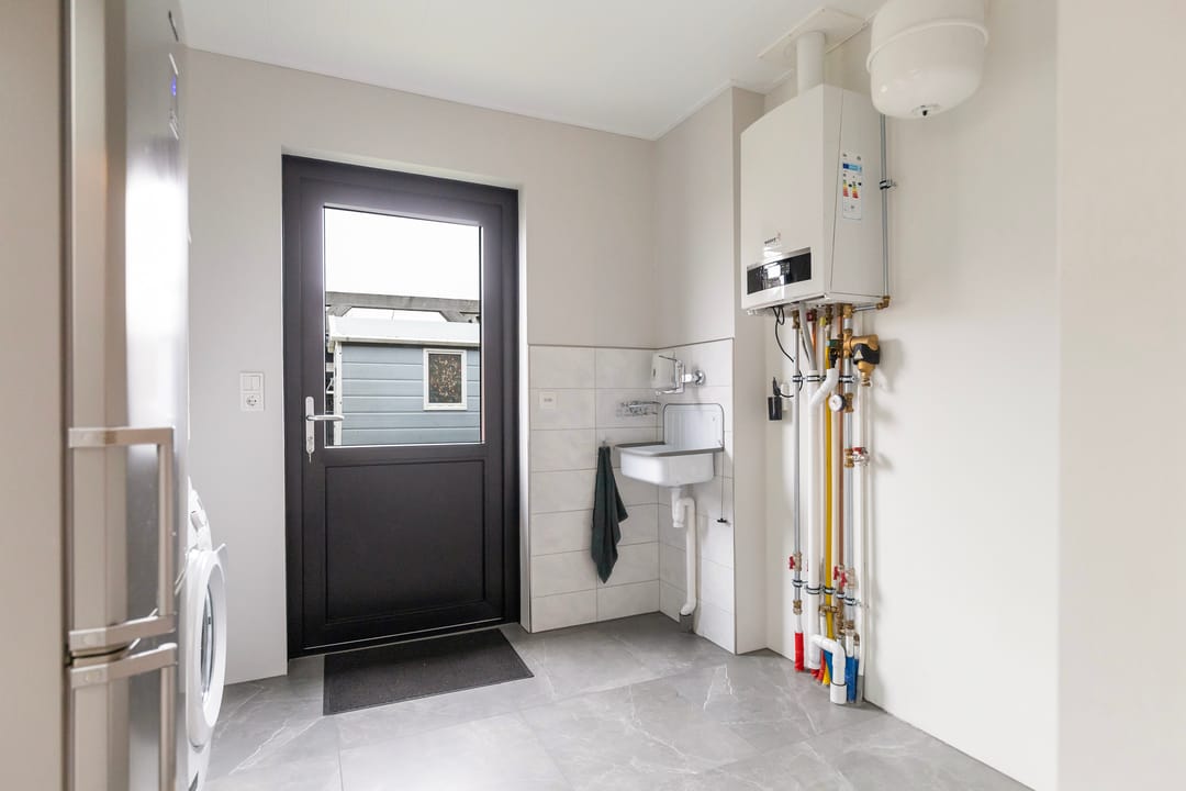 Foto 17 van Tienwoningenweg 39