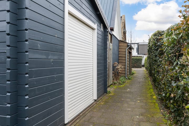 Foto 30 van Tienwoningenweg 39