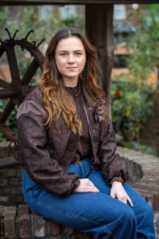 Romy - Makelaar (Directeur)