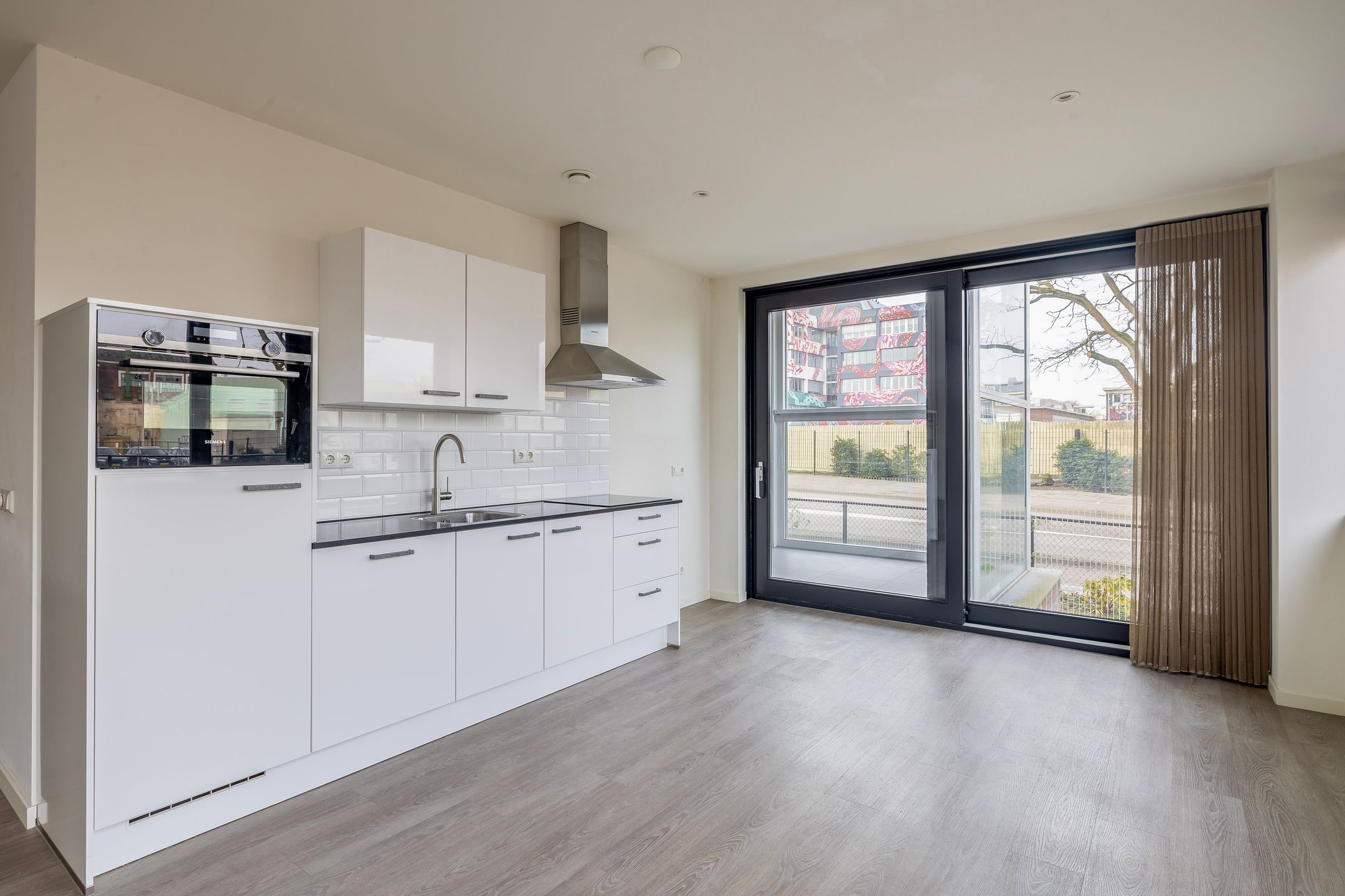 Foto 27 van Binnen Parallelweg 12