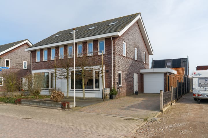 Foto 1 van De Pinksterblom 6