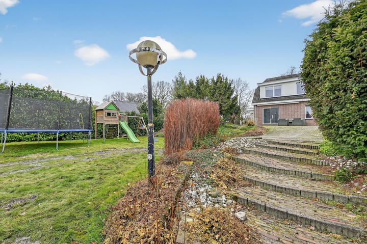 Spacious detached home with canal views and large garden in Klazienaveen-Noord — 88