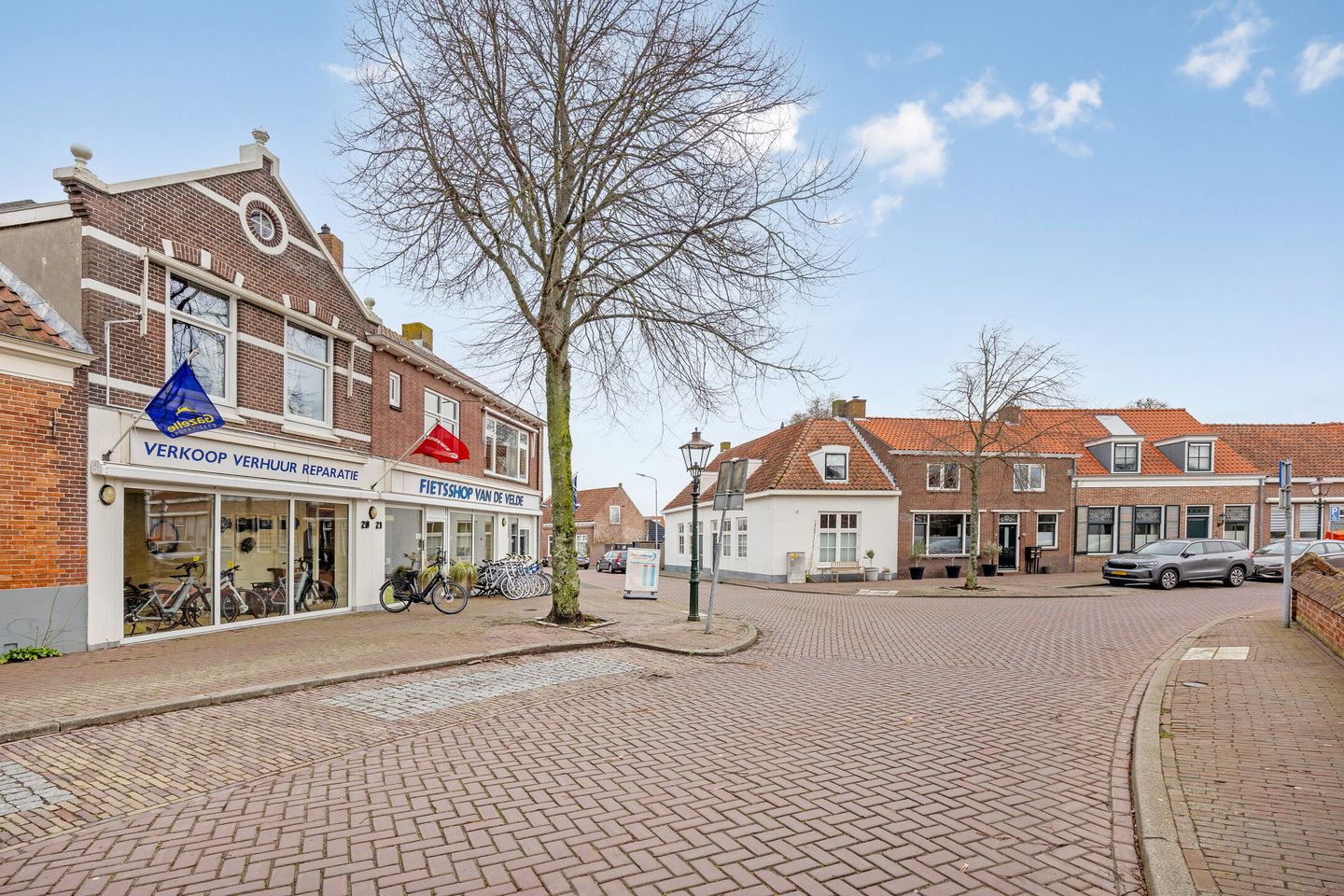 View photo 2 of Dorpsplein 18-21