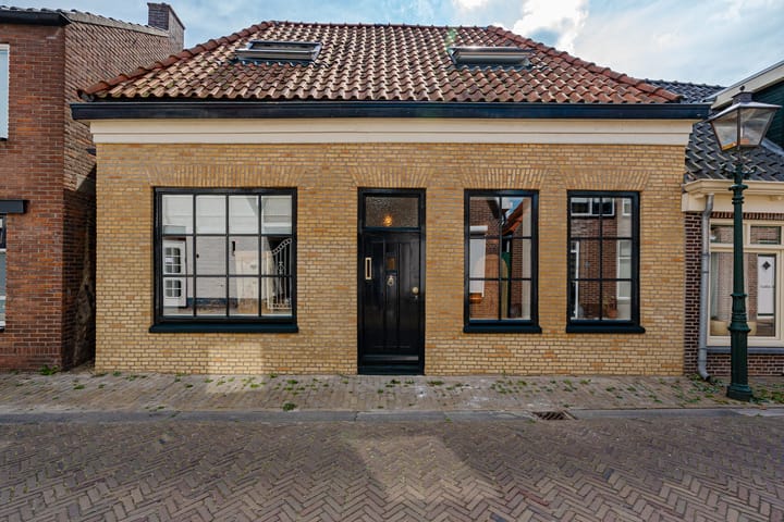 Stylishly Renovated Farmhouse with Versatile Living Spaces — 142