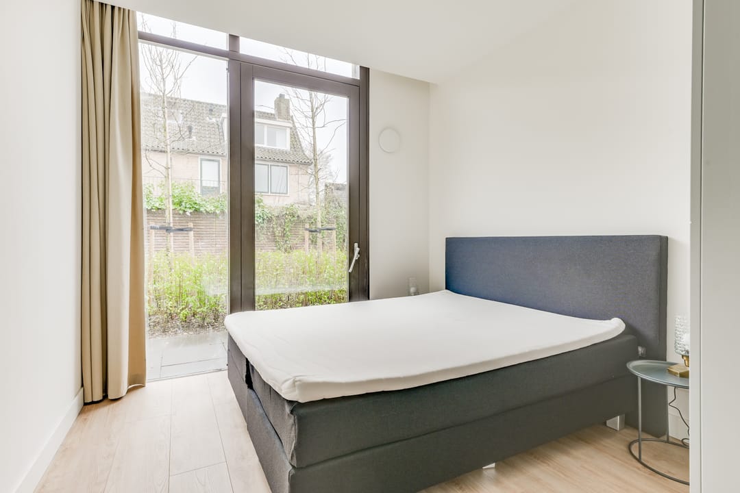 Foto 11 van Kennemerstraatweg 21-T