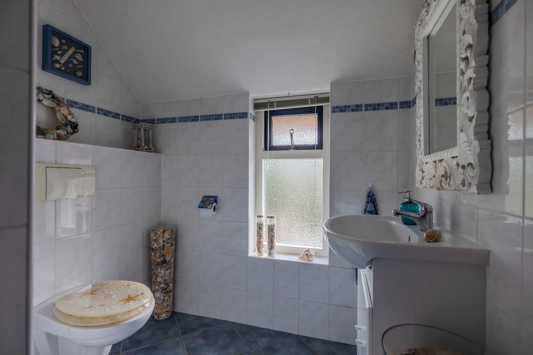 Foto 26 van W H van Heemstraweg 10