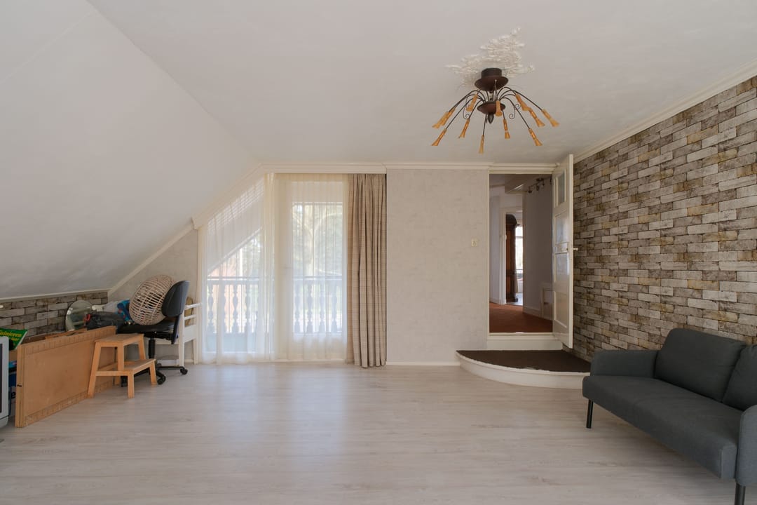 Characteristic Semi-Detached Family Home with Spacious Garden and Water View in Almelo — 17