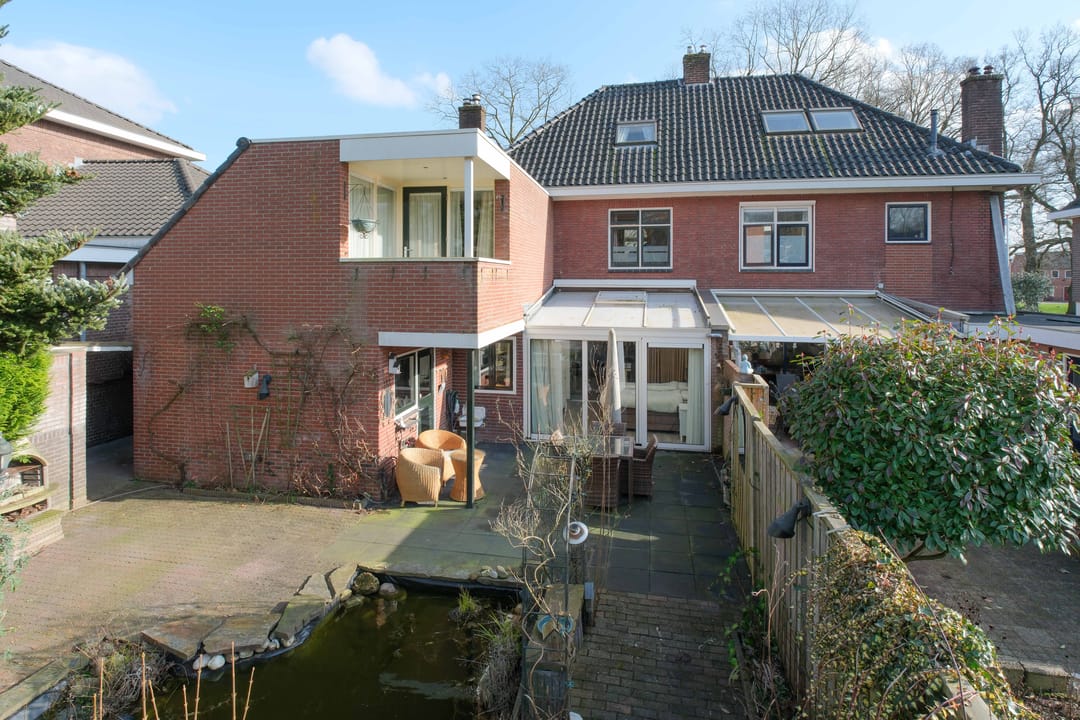 Characteristic Semi-Detached Family Home with Spacious Garden and Water View in Almelo — 28