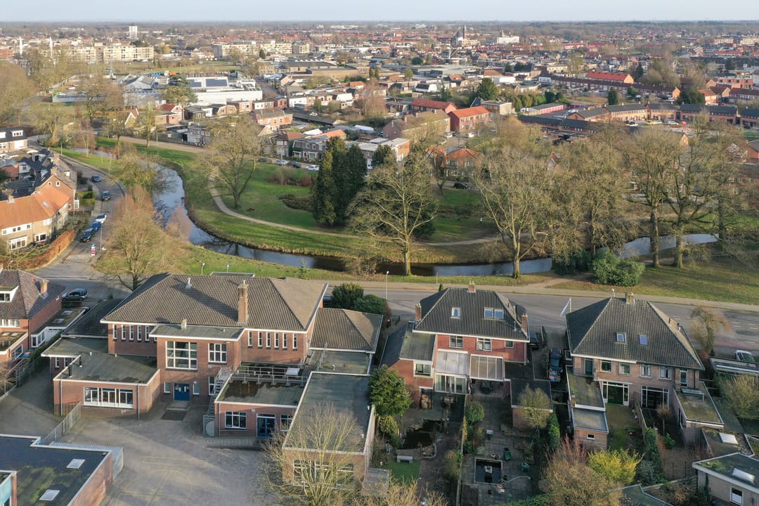 Characteristic Semi-Detached Family Home with Spacious Garden and Water View in Almelo — 31