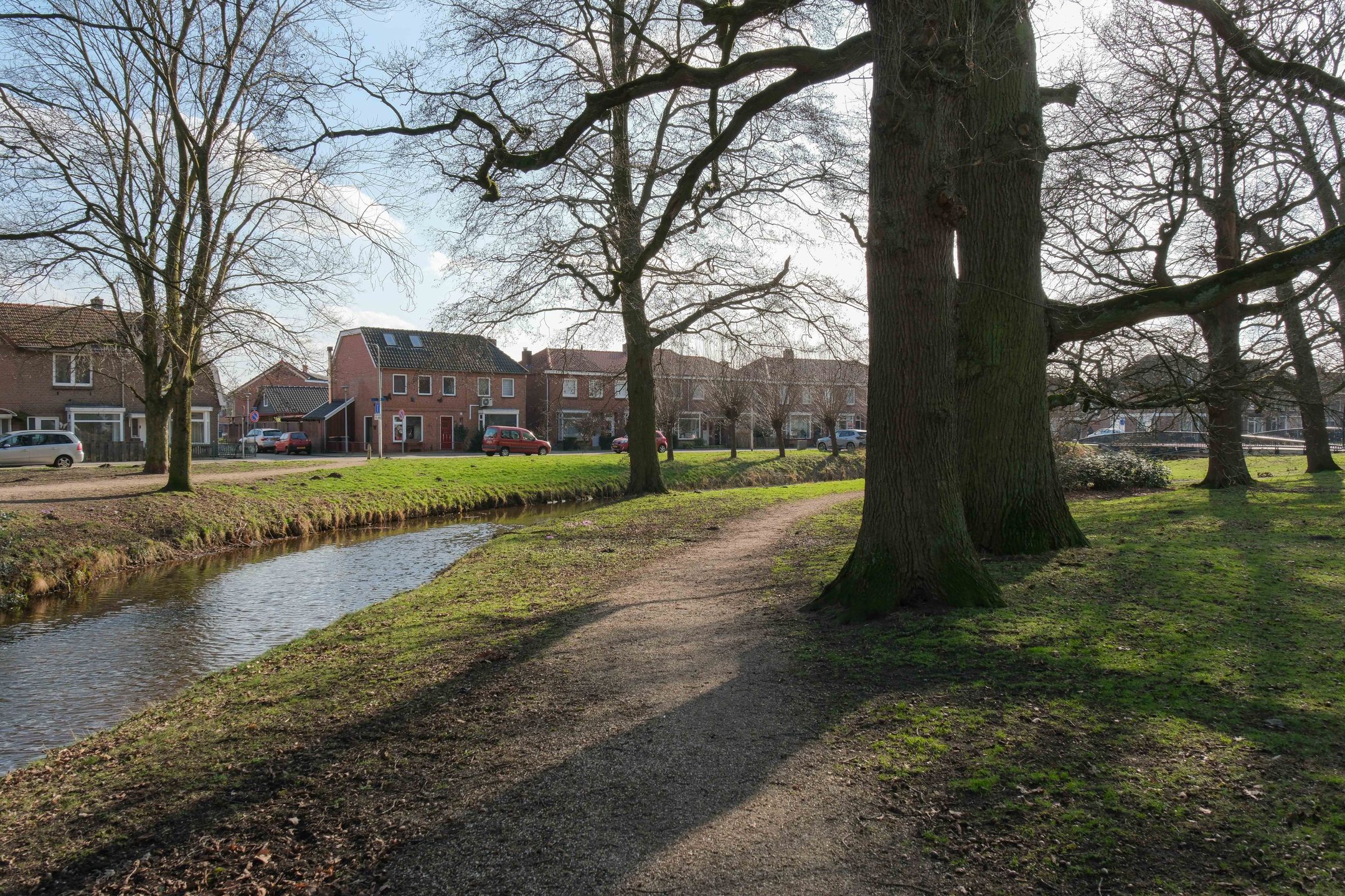 Characteristic Semi-Detached Family Home with Spacious Garden and Water View in Almelo — 33