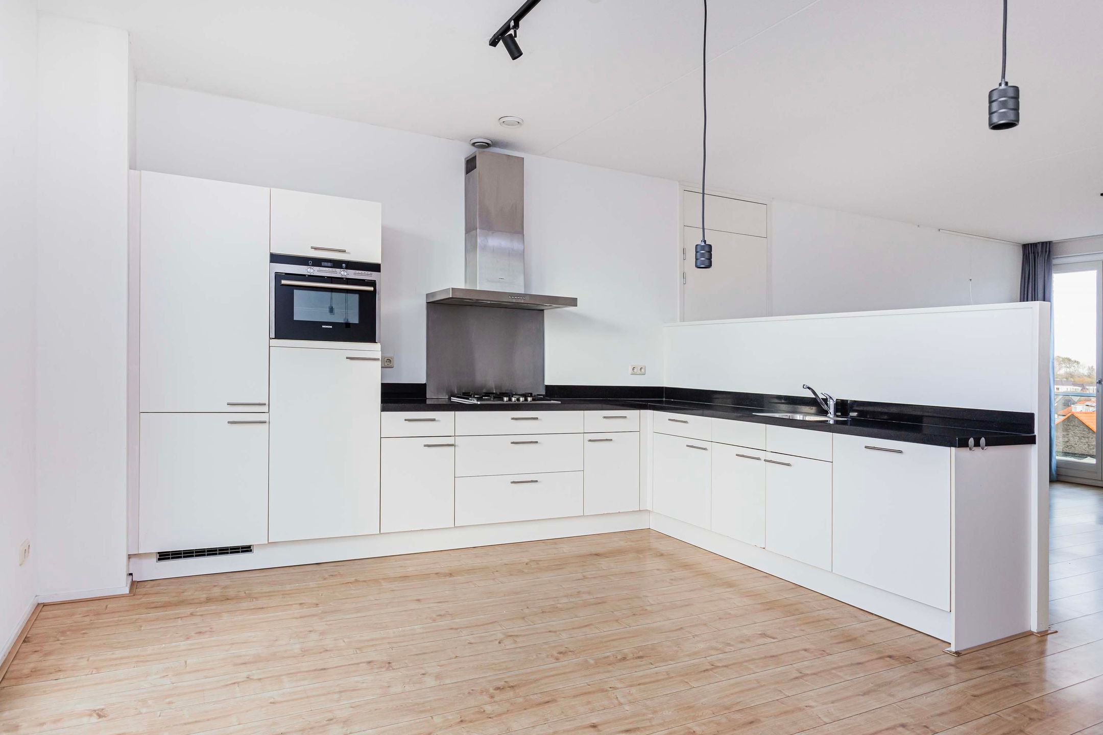 Foto 12 van J. Homan van der Heideplein 34