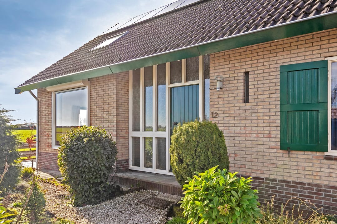 Spacious detached bungalow with panoramic polder view — 57