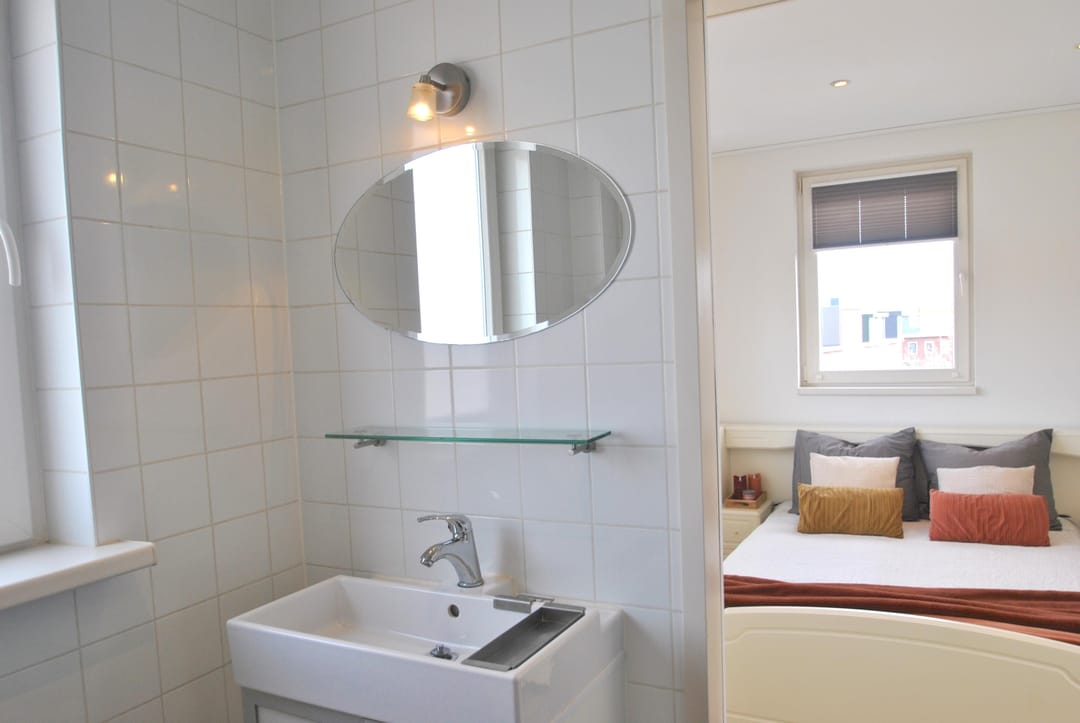Licht hoekappartement met vrij uitzicht en geen bovenburen in de Indische Buurt — 23
