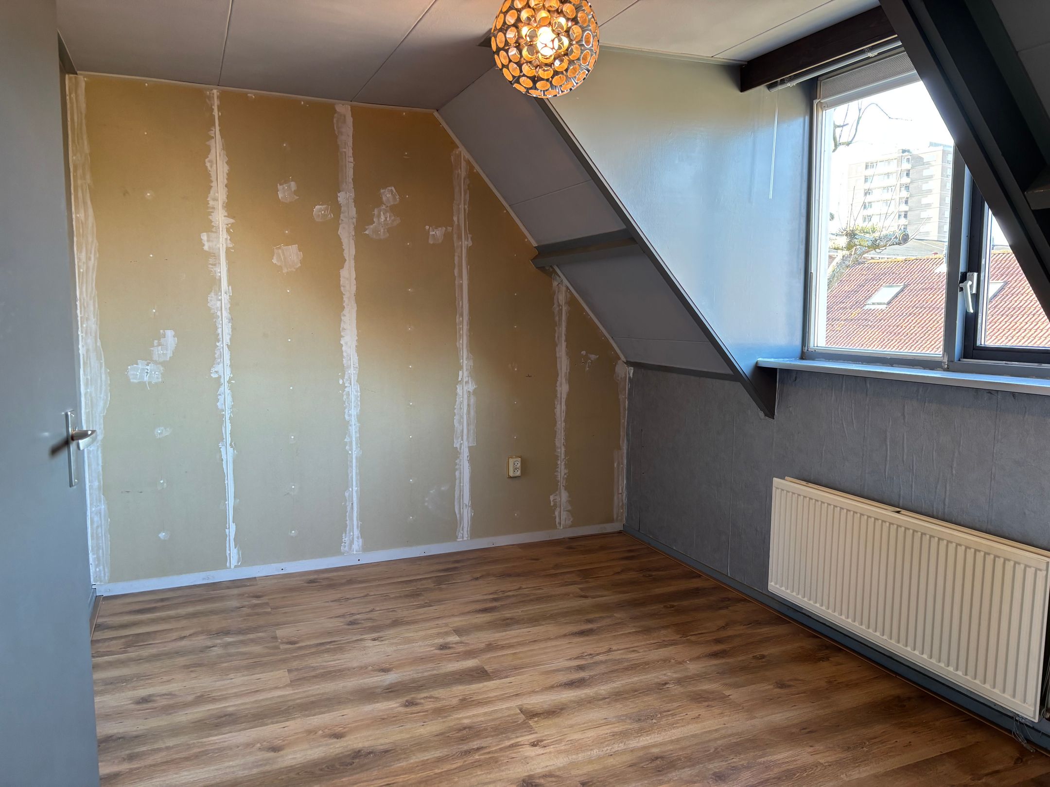 Foto 15 van Reggestraat 1