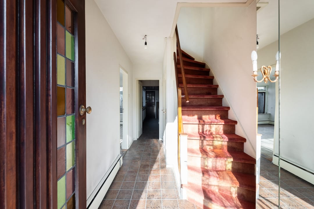 Spacious corner home with garage and renovation potential in central Noordwijk — 16