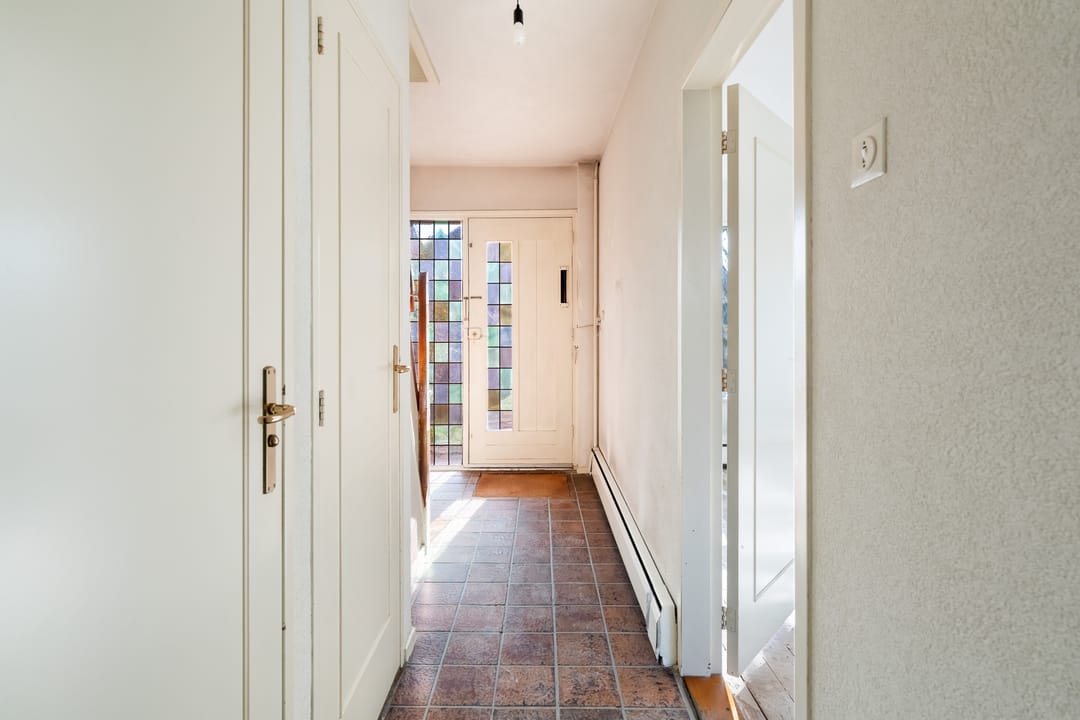 Spacious corner home with garage and renovation potential in central Noordwijk — 15