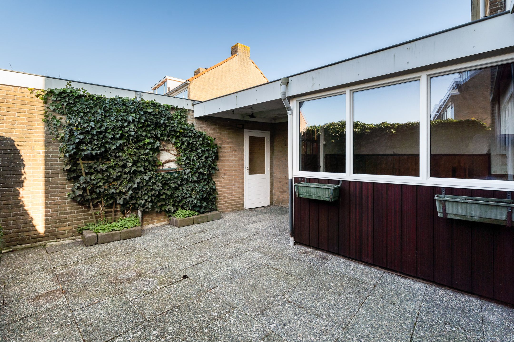 Spacious corner home with garage and renovation potential in central Noordwijk — 35