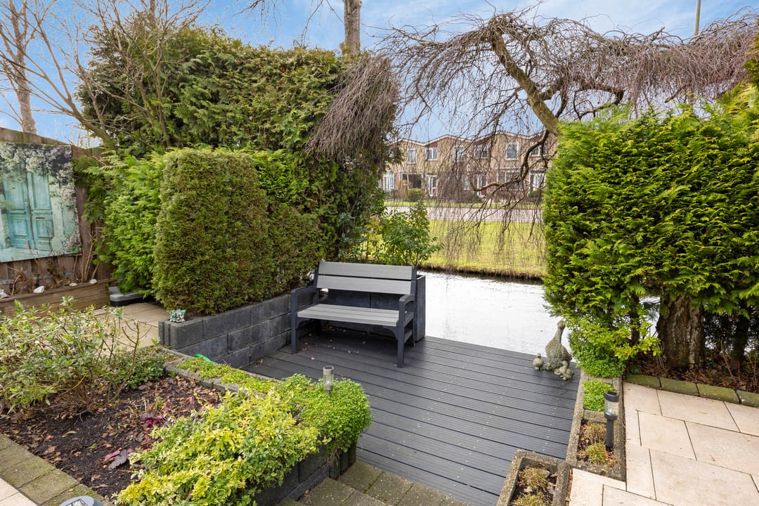 Spacious extended corner home with water garden and solar panels — 22